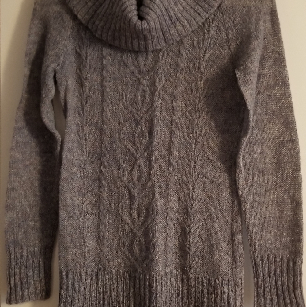 Knitted sweater.